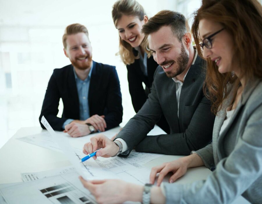 business-people-working-together-on-project-and-brainstorming-in-office.jpg